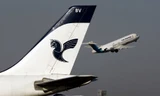 Một chiếc máy bay loại Fokker 100 cất cánh từ sân bay Tehran. Ảnh: Reuters