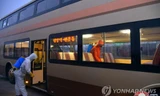 Khử khuẩn phòng dịch ở Triều Tiên. Ảnh: Yonhap