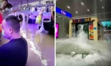 Nước lũ đổ như thác xuống ga tàu điện ngầm. Ảnh chụp màn hình