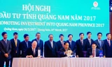 Thủ tướng chứng kiến lễ ký cam kết đầu tư giữa tỉnh Quảng Nam và các nhà đầu tư sáng 26/3. Ảnh H.V.
