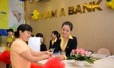 NamABank sẽ trở thành ngân hàng đầu tiên sáp nhập trong năm 2015.