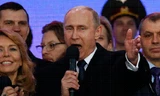 Tổng thống Putin hát quốc ca Nga trong lễ kỷ niệm một năm ngày Crimea trở về với Nga.
