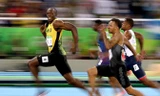 Với nước rút thần tốc, Usain Bolt vẫn không có đối thủ trên đường chạy 100m. Ảnh: GETTY IMAGES.