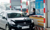 Trạm thu phí Bến Thủy tăng giá vé ngay trong sáng ngày đầu năm 2016. Ảnh: Văn Bình.
