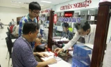 Sở KH&ĐT Đà Nẵng có 10 học viên Đề án 922 đang công tác. (Trong ảnh: Người dân làm thủ tục tại khu một cửa của Sở tại Trung tâm hành chính thành phố). Ảnh: Thanh Trần.