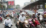 Hà Nội hiện có 5,6 triệu phương tiện giao thông và lưu lượng đã vượt thiết kế mặt đường. Ảnh: Trọng Đảng.