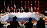 Lãnh đạo các quốc gia trên bàn đàm phán, ký kết Hiệp định TPP đầu tháng 10/2015.