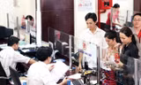 Thuế thu nhập cá nhân sẽ được điều chỉnh theo hướng giảm. Ảnh: Hồng Vĩnh.