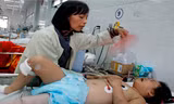Cháu Trần Khánh Linh (8 tuổi) đã nhận thức và gọi tên được người thân.