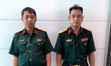 Hai đối tượng tại cơ quan công an (ảnh: HL)