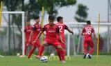 Các cầu thủ ÐT U22 Việt Nam tập luyện trước ngày lên đường sang Trung Quốc. Ảnh: VSI