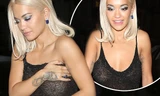 Rita Ora mải giữ váy vì trót mặc xuyên thấu hớ hênh
