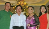 Vợ chồng doanh nhân Lê Văn Kiểm, Trần Cẩm Nhung và hai người con