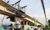 Cận cảnh cầu hơn 900 tỷ ở khu đông TPHCM hợp long nhịp chính sau 4 năm 'đắp chiếu'