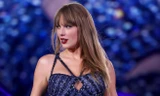 Taylor Swift trốn trong vali 