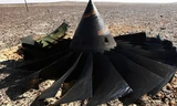 Các mảnh vỡ máy bay rơi trên sa mạc Sinai. Ảnh: Sputnik
