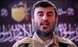 Zahran Alloush, chỉ huy nhóm nổi dậy Jaysh al Islam. Ảnh: NewSyria