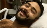 Chris Mintz đã trở thành người hùng khi lấy thân mình chắn đạn cứu bạn trong vụ xả súng. (Nguồn: express) 