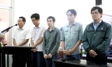 Các bị cáo tại phiên tòa xử vụ '5 công an đánh chết nghi phạm'.