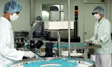 Sản xuất vắc xin phòng bệnh tại Công ty Vabiotech. Ảnh: TTXVN
