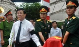 Chủ tịch nước Trương Tấn Sang tham dự Lễ truy điệu và an táng hài cốt các liệt sĩ. Ảnh: TTXVN