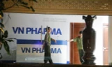 Khám xét Cty VN Pharma tại quận 10, TPHCM. Ảnh: Lao Động.