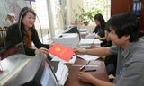 Thủ tục làm sổ đỏ sẽ được cắt giảm nhiều công đoạn, giấy tờ. Ảnh: Ngọc Châu 