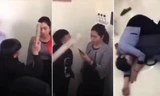 Cô giáo H, bị học sinh dồn vào tường, có lời lẽ xúc phạm (ảnh cắt từ video) 