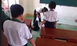 Nhìn nhau không thiện cảm, một nữ sinh bị bạn cùng lớp đánh, quay clip