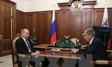 Tổng thống Nga Vladimir Putin (trái) và Ngoại trưởng Nga Sergei Lavrov (phải) trong cuộc gặp tại Moskva ngày 10/2. (Nguồn: AFP/TTXVN)