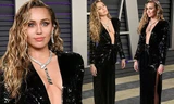 Miley Cyrus diện đầm xẻ sâu hờ hững cùng chồng dự tiệc Oscar