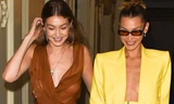 Bella Hadid phanh áo ‘thả rông’ vòng một, đọ dáng với chị gái ở Paris