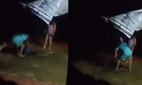 Người đàn ông bị vợ và con trói, đánh gây bức xúc. Ảnh cắt từ clip