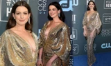 Anne Hathaway diện mốt không nội y trên thảm xanh sau vài tuần sinh con