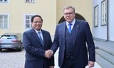 Thủ tướng Phạm Minh Chính và Chủ tịch Quốc hội Estonia Lauri Hussar. Ảnh: VGP