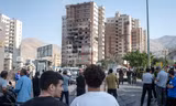 Một toà chung cư ở Tehran hư hại sau vụ tấn công của Israel ngày 13/6. (Ảnh: Getty)