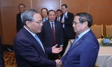 Thủ tướng Phạm Minh Chính trong cuộc gặp Thủ tướng Trung Quốc Lý Cường. Ảnh: VGP