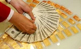 Giá vàng, USD quay đầu giảm nhẹ. Ảnh minh hoạ 
