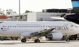 Một chiếc máy bay của hãng Libya Airlines bị hư hại trong cuộc tấn công của nhóm Rạng đông Libya vào sân bay quốc tế Tripoli ngày 26/8.