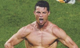 Ronaldo khoe “phom” chuẩn sau khi ghi bàn ấn định chiến thắng cho Real Madrid. Ảnh: AP 