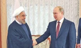 Tổng thống Nga Putin (phải) và Tổng thống Iran Rouhani
