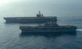 Tàu đổ bộ USS Makin (LHD-8) và tàu sân bay USS Theodore Roosevelt (CVN-71) quá cảnh Biển Đông vào ngày 9 tháng 4 năm 2021. Ảnh: Hải quân Mỹ