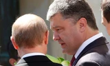 Tổng thống Nga Vladimir Putin và tân Tổng thống Ukraine Petro Poroshenko gặp nhau bên lề lễ kỷ niệm sự kiện Normandy