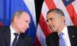 Ông Putin (trái) đã có cuộc gặp đầu tiên với ông Obama sau nhiều tháng "đóng băng quan hệ" do cuộc khủng hoảng Ukraine