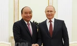 Chủ tịch nước Nguyễn Xuân Phúc hội đàm với Tổng thống Nga Vladimir Putin. (Ảnh: TTXVN)