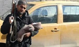 Lộ diện kẻ bịt mặt trong clip mới của IS