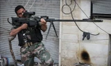 Một tay súng của lực lượng nổi dậy Syria. (Nguồn: timesofisrael.com) 