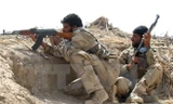 Binh sỹ Iraq trong một cuộc giao tranh với các tay súng IS . (Nguồn: AFP/TTXVN)