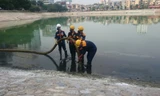Bơm cạn nước, xử lý sạch đáy hồ Ngọc Khánh