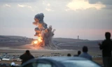 Khói bốc lên sau một cuộc không kích ở Kobani, Syria.